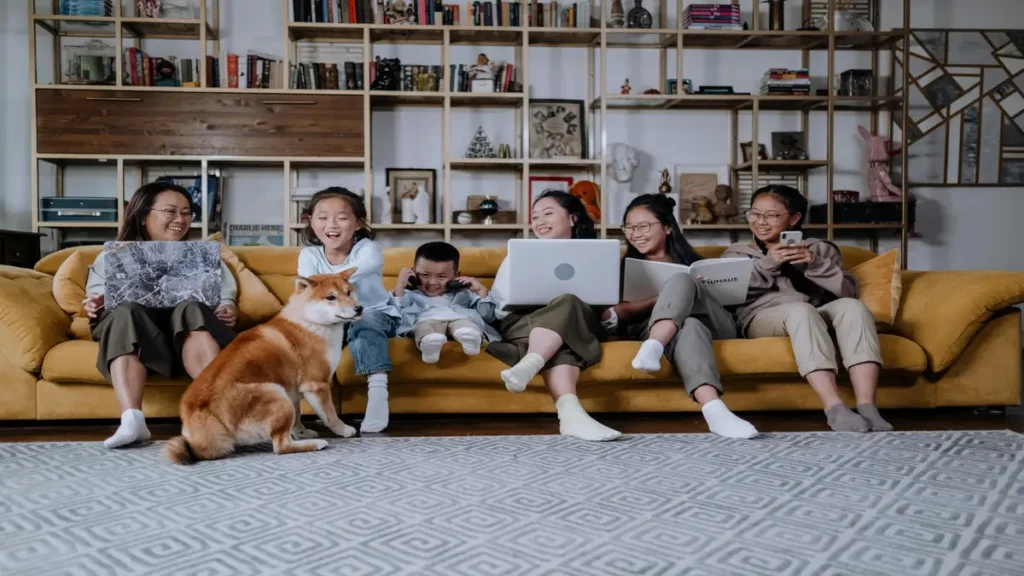 a family all using tech devices