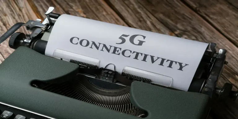 5G Technology connectivity concept shown on vintage typewriter paper, symbolizing the evolution of communication infrastructure.