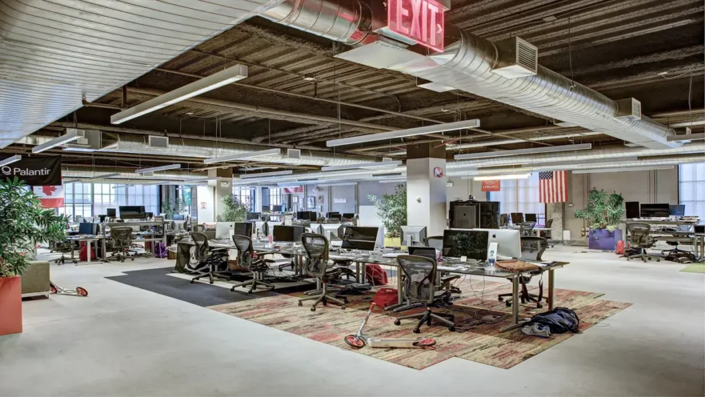 Inside Palantir Technologies headquarters showing modern open-concept workspace
